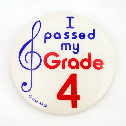 Grade 4 I Passed Badge 55mm Ø - White Circular with Blue and Red Printing