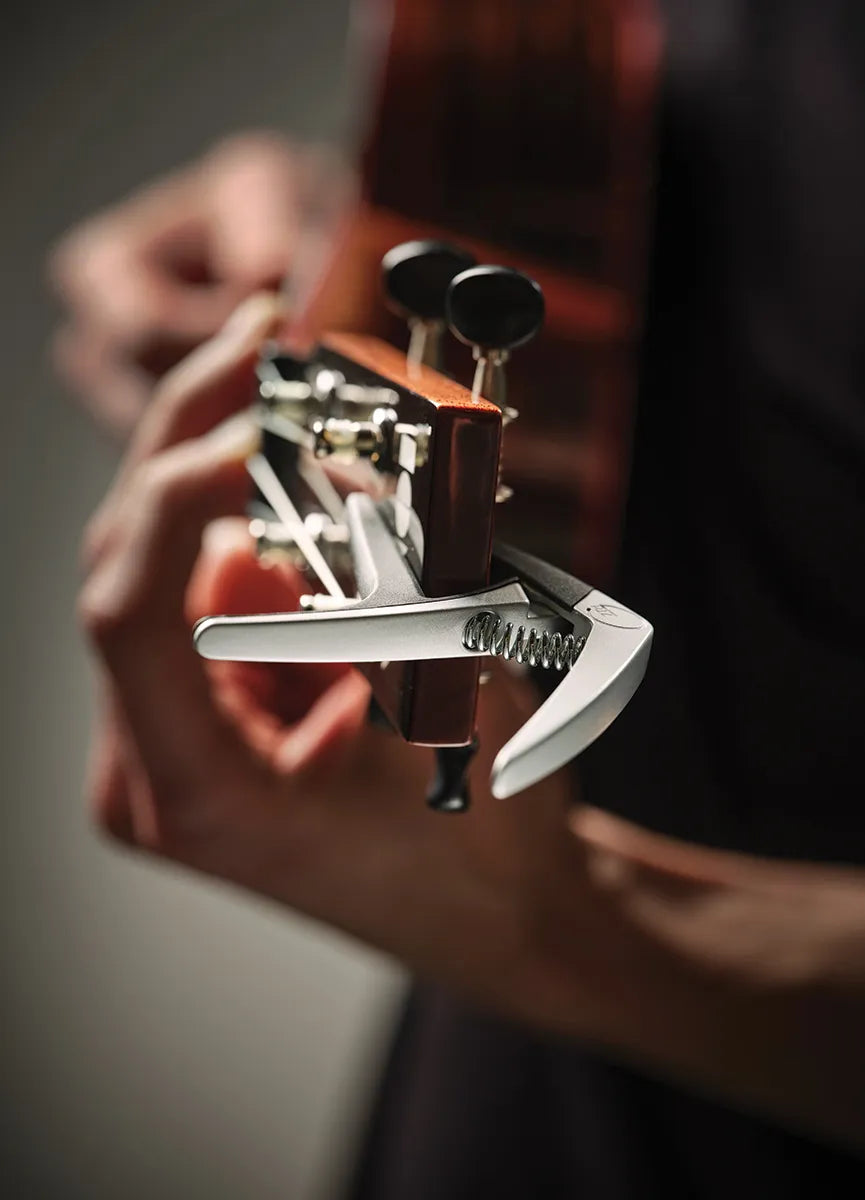 G7 Nashville Ukulele Silver Capo - Lightweight, easy to use, reduces tuning issues, suitable for all ukulele sizes, silicone wrap for tone protection. — view 3