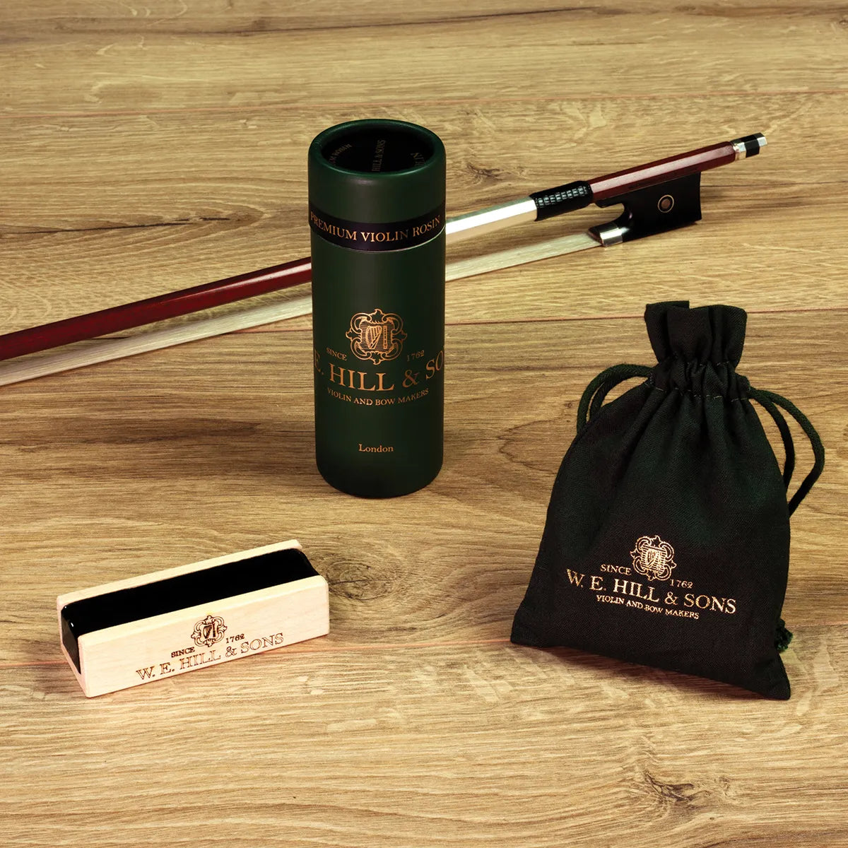 W.E. Hill & Sons 2065M Premium Violin Dark/Medium Rosin in Maplewood Holder with Drawstring Bag - 20g