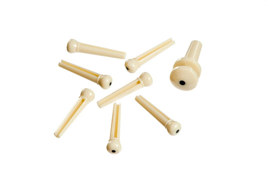 Planet Waves Injected Molded Bridge Pins with End Pin, Set of 7, Ivory with Black Dot